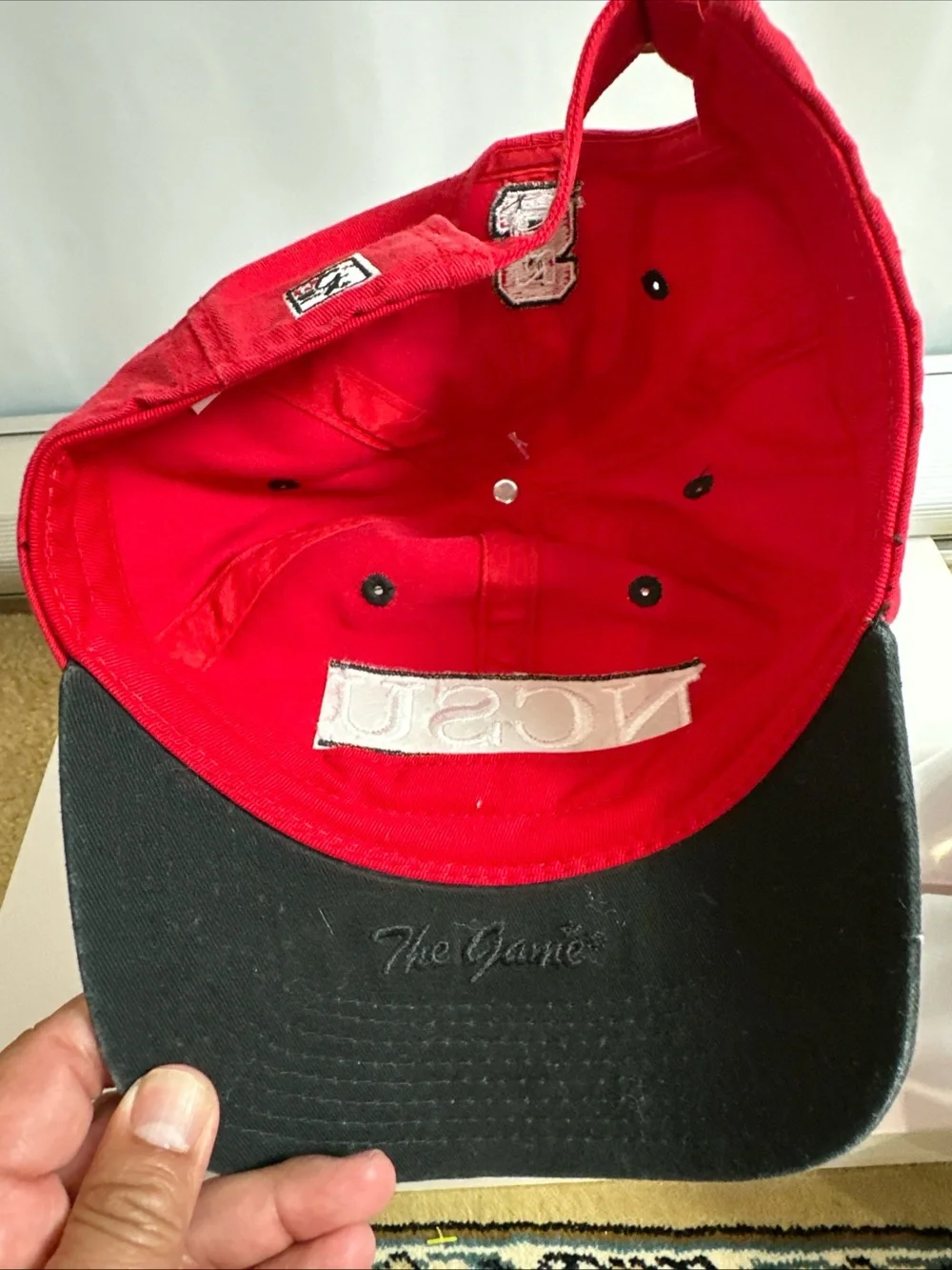 The Game Red Baseball Cap with White Embroidered Patch North Carolina State